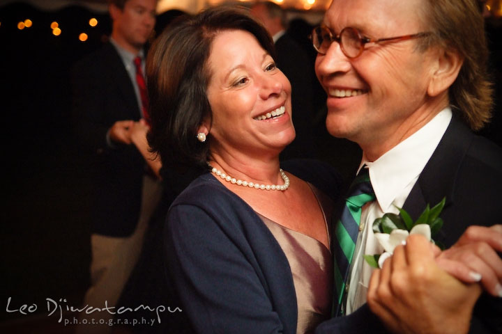 Bride's mother dancing with stepfather. Annapolis Kent Island Maryland Wedding Photography with live dance band at reception