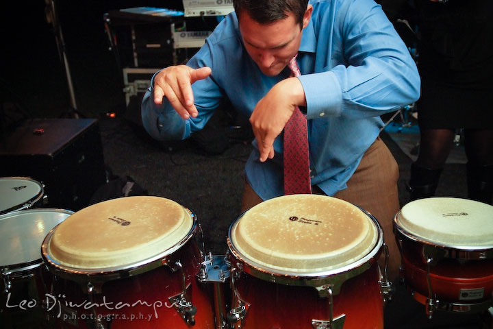 A guests played the band's percussion. Annapolis Kent Island Maryland Wedding Photography with live dance band at reception