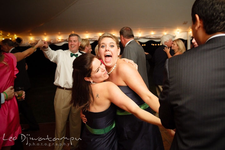 Bridesmaids dancing together, having fun. Annapolis Kent Island Maryland Wedding Photography with live dance band at reception