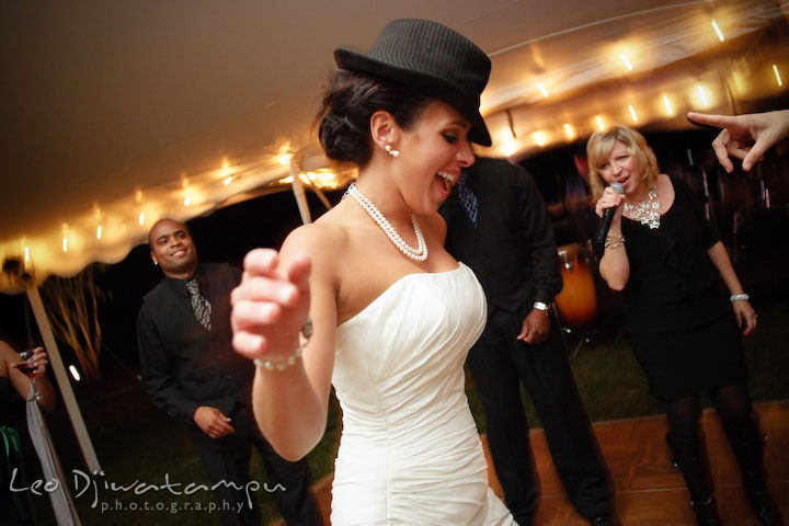 Bride wearing a hat and dancing with the music. Annapolis Kent Island Maryland Wedding Photography with live dance band at reception