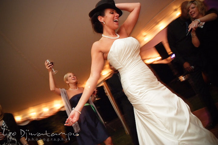 The bride having fun dancing. Annapolis Kent Island Maryland Wedding Photography with live dance band at reception