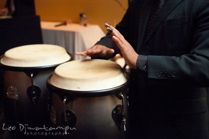 Musician playing percussion. The Grand Marquis, Old Bridge, New Jersey wedding photos by wedding photographers of Leo Dj Photography.