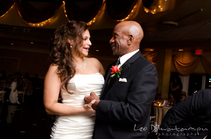 Bride talking with father of groom. The Grand Marquis, Old Bridge, New Jersey wedding photos by wedding photographers of Leo Dj Photography.