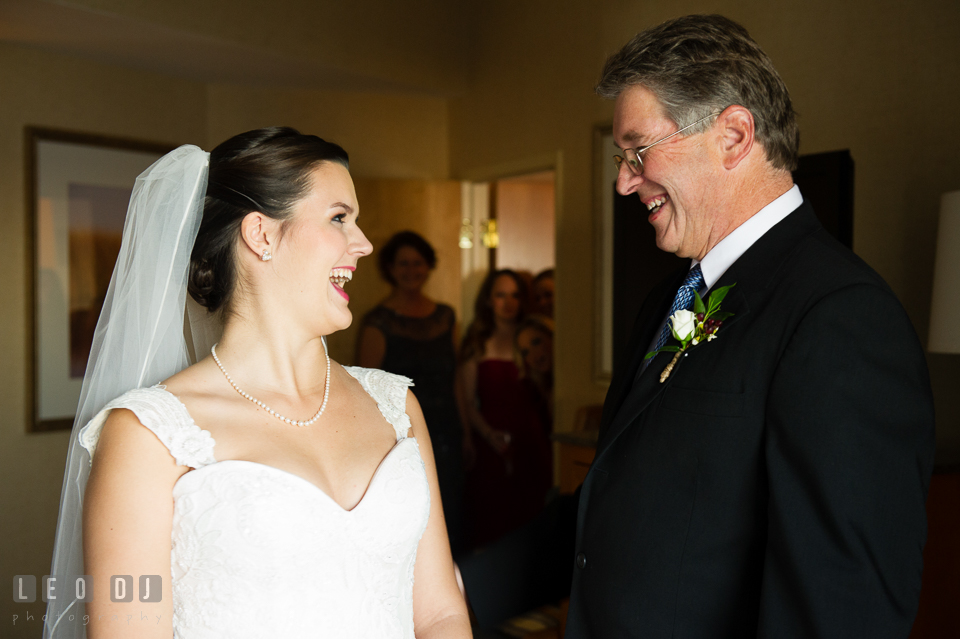 Bride smiling with Father of the Bride upon first reveal. Hyatt Regency Chesapeake Bay wedding at Cambridge Maryland, by wedding photographers of Leo Dj Photography. http://leodjphoto.com