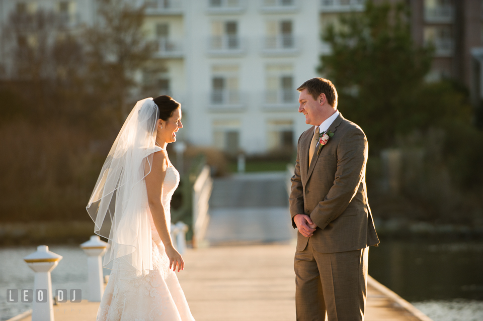 Proud Groom looking at his Bride during first look. Hyatt Regency Chesapeake Bay wedding at Cambridge Maryland, by wedding photographers of Leo Dj Photography. http://leodjphoto.com