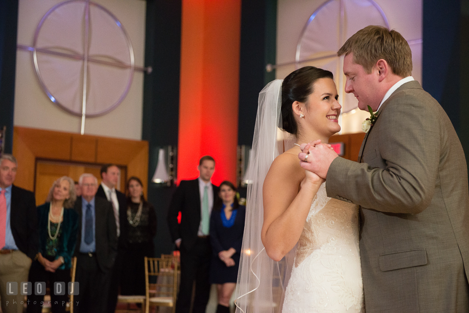 Bride and Groom smiling during first dance. Hyatt Regency Chesapeake Bay wedding at Cambridge Maryland, by wedding photographers of Leo Dj Photography. http://leodjphoto.com