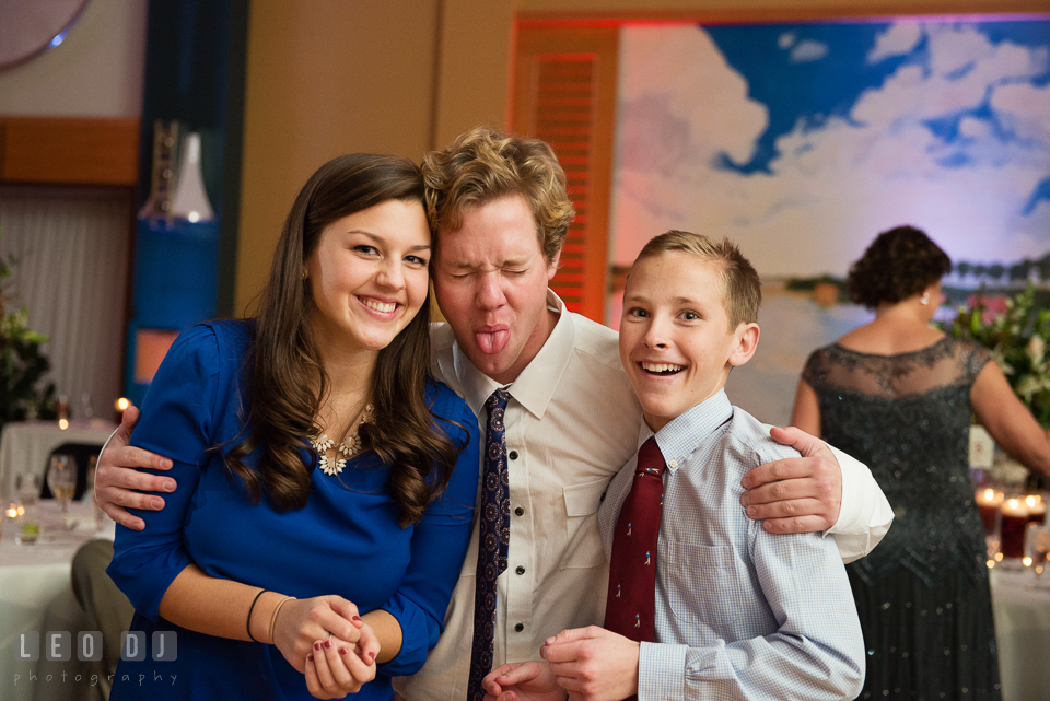 Guests making goofy faces during wedding reception. Hyatt Regency Chesapeake Bay wedding at Cambridge Maryland, by wedding photographers of Leo Dj Photography. http://leodjphoto.com