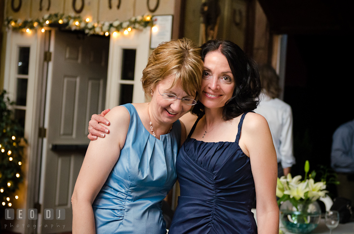 Bride and Groom's mother laughing together. Ostertag Vistas wedding reception photos at Myersville, Maryland by photographers of Leo Dj Photography. http://leodjphoto.com