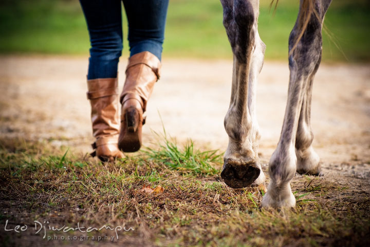 Girl owners boots and mare's hoofs. Annapolis Kent Island Maryland High School Senior Portrait Photography with Horse Pet by photographer Leo Dj