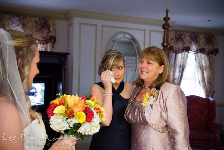 Mother of Bride and sister shed tear, proud of their daughter or sister. Mariott Aspen Wye River Conference Center Wedding photos at Queenstown Eastern Shore Maryland, by photographers of Leo Dj Photography.