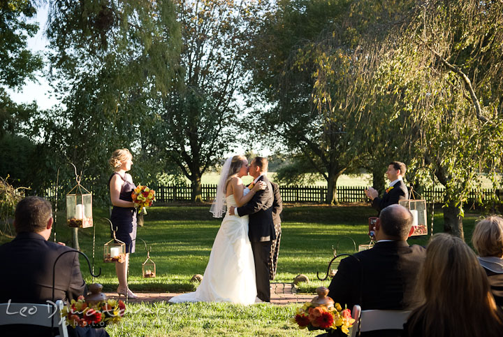 Bride and Groom kissing after exchanging ring. Mariott Aspen Wye River Conference Center Wedding photos at Queenstown Eastern Shore Maryland, by photographers of Leo Dj Photography.