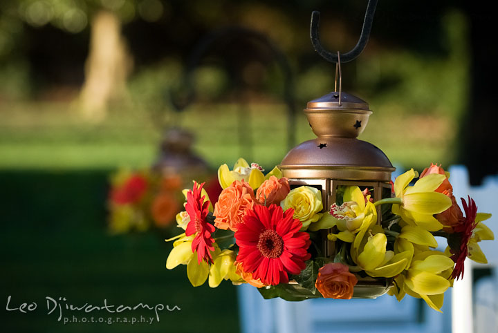 Floral arrangement at the ceremony site, by Houghton House. Mariott Aspen Wye River Conference Center Wedding photos at Queenstown Eastern Shore Maryland, by photographers of Leo Dj Photography.