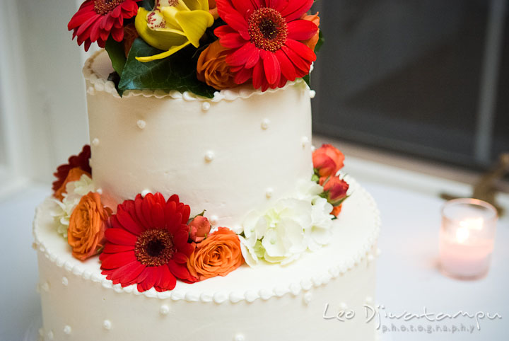 Wedding cake with flower decorations. Mariott Aspen Wye River Conference Center Wedding photos at Queenstown Eastern Shore Maryland, by photographers of Leo Dj Photography.