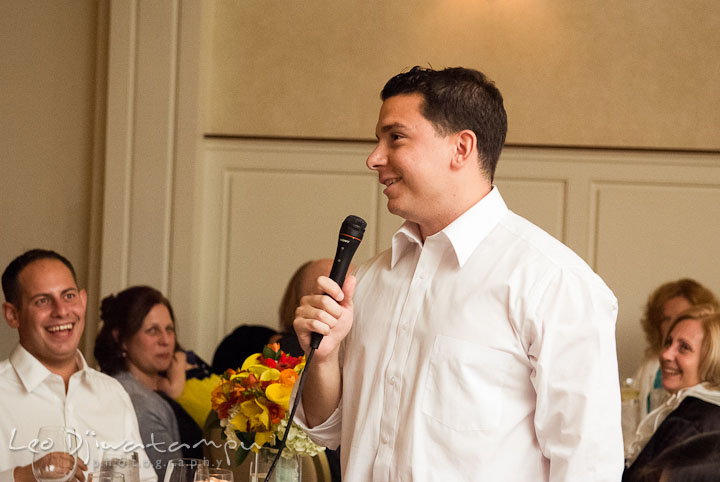 Best Man speech, Groom laughing. Mariott Aspen Wye River Conference Center Wedding photos at Queenstown Eastern Shore Maryland, by photographers of Leo Dj Photography.