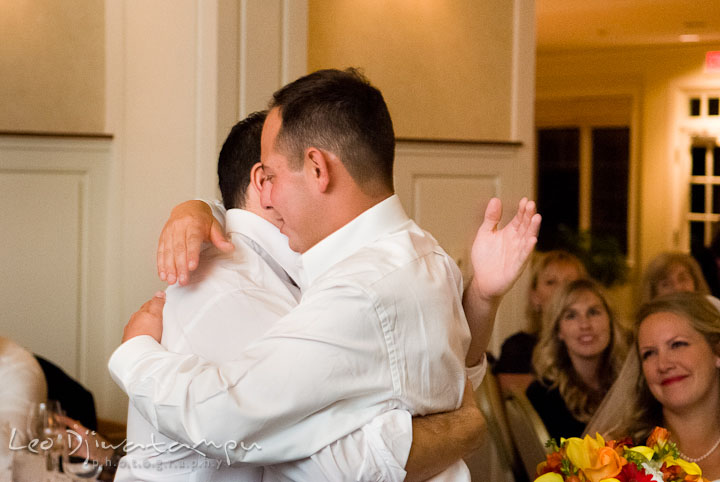 Best Man and Groom hugged after speech. Mariott Aspen Wye River Conference Center Wedding photos at Queenstown Eastern Shore Maryland, by photographers of Leo Dj Photography.