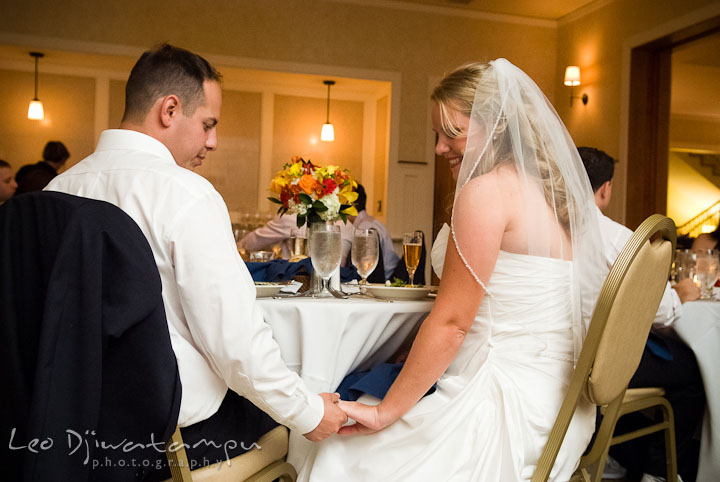 Groom admiring Bride's wedding ring. Mariott Aspen Wye River Conference Center Wedding photos at Queenstown Eastern Shore Maryland, by photographers of Leo Dj Photography.