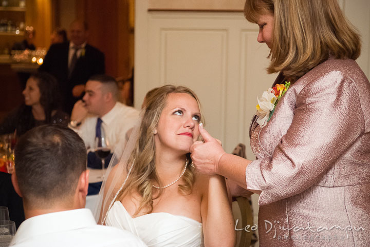 Mother of Bride wiping off tears from daugther's eyes. Mariott Aspen Wye River Conference Center Wedding photos at Queenstown Eastern Shore Maryland, by photographers of Leo Dj Photography.