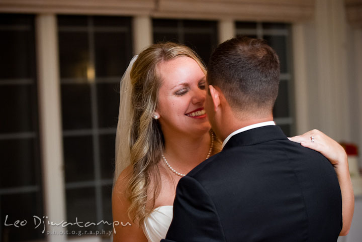 Bride and Groom smiling during first dance. Mariott Aspen Wye River Conference Center Wedding photos at Queenstown Eastern Shore Maryland, by photographers of Leo Dj Photography.