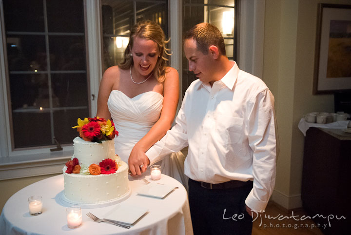 Bride and Groom cuting wedding cake. Mariott Aspen Wye River Conference Center Wedding photos at Queenstown Eastern Shore Maryland, by photographers of Leo Dj Photography.