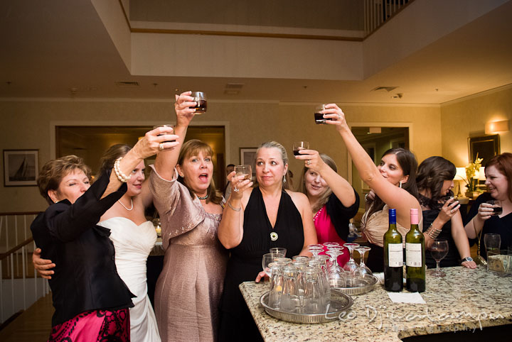 Guests having drink and toast to the newly wed couple. Mariott Aspen Wye River Conference Center Wedding photos at Queenstown Eastern Shore Maryland, by photographers of Leo Dj Photography.