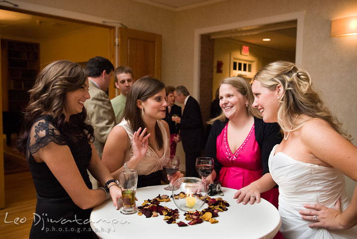 Guests talking and laughing with Bride. Mariott Aspen Wye River Conference Center Wedding photos at Queenstown Eastern Shore Maryland, by photographers of Leo Dj Photography.