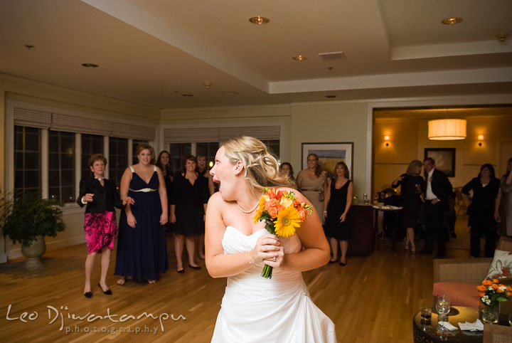 Bride ready for bouquet toss. Mariott Aspen Wye River Conference Center Wedding photos at Queenstown Eastern Shore Maryland, by photographers of Leo Dj Photography.