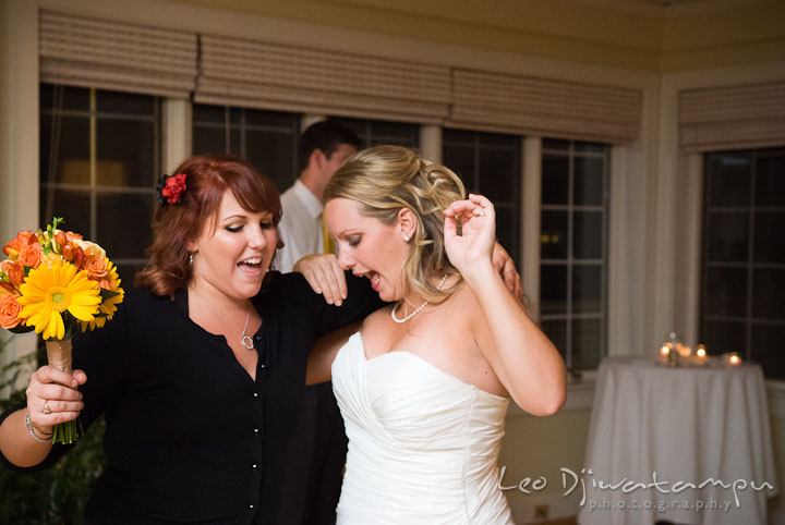 Bride dancing to Britney Spears "Baby One More Time" with best friend. Mariott Aspen Wye River Conference Center Wedding photos at Queenstown Eastern Shore Maryland, by photographers of Leo Dj Photography.