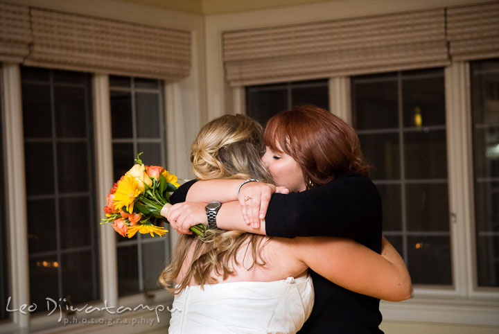 Bride and best friend hugging. Mariott Aspen Wye River Conference Center Wedding photos at Queenstown Eastern Shore Maryland, by photographers of Leo Dj Photography.