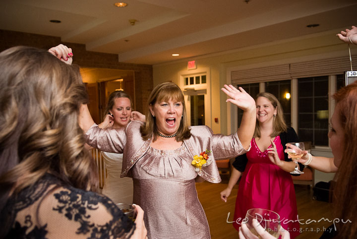 Mother of Bride dancing with guests. Mariott Aspen Wye River Conference Center Wedding photos at Queenstown Eastern Shore Maryland, by photographers of Leo Dj Photography.