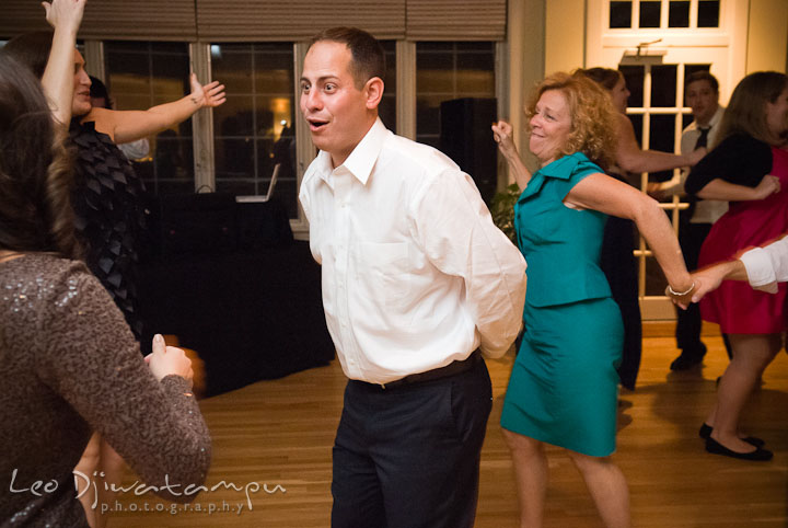 Groom dancing with other guests. Mariott Aspen Wye River Conference Center Wedding photos at Queenstown Eastern Shore Maryland, by photographers of Leo Dj Photography.