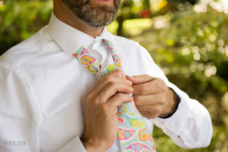 At home backyard wedding Groom put on tie photo by Leo Dj Photography