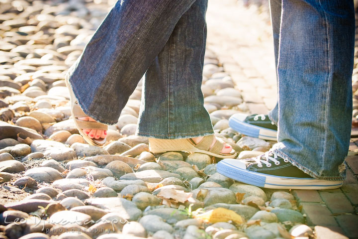 Engaged couple's shoes on cobble stone street. Candid Old Town Alexandria Virginia Engagement Photography Session by Wedding Photographer Leo Dj