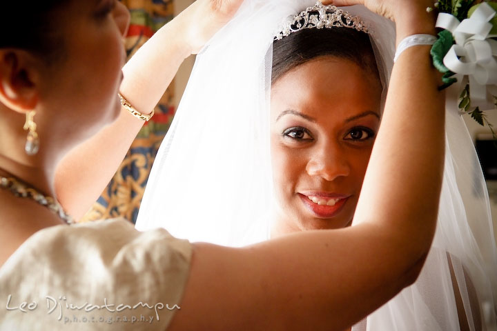 Mother of bride putting veil on her daughter's hair. Wedding photography at Padonia Park Club at Towson, Timonium-Cockeysville area, North of Baltimore