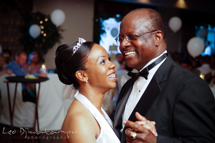 Father of the bride happily danced with her daughter, both smiling, laughing. Wedding photography at Padonia Park Club at Towson, Timonium-Cockeysville area, North of Baltimore