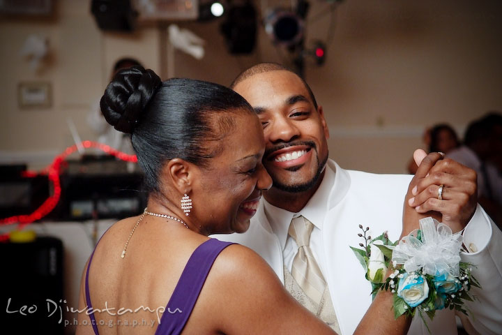 Mother of groom and her son dancing, smiling, laughing. Wedding photography at Padonia Park Club at Towson, Timonium-Cockeysville area, North of Baltimore