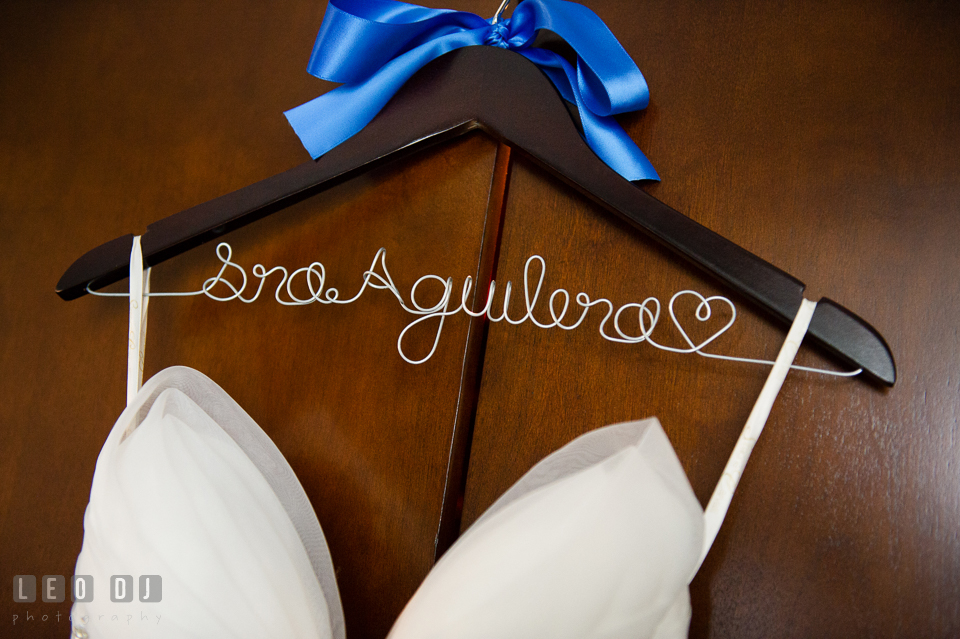 Beautiful wedding dress hung on hanger from Etsy with last name. Falls Church Virginia 2941 Restaurant wedding ceremony and reception photo, by wedding photographers of Leo Dj Photography. http://leodjphoto.com