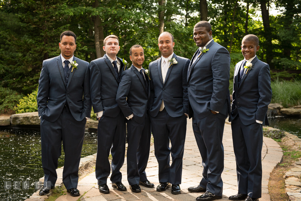 Groom posing with his Best Man and Groomsmen. Falls Church Virginia 2941 Restaurant wedding ceremony and reception photo, by wedding photographers of Leo Dj Photography. http://leodjphoto.com