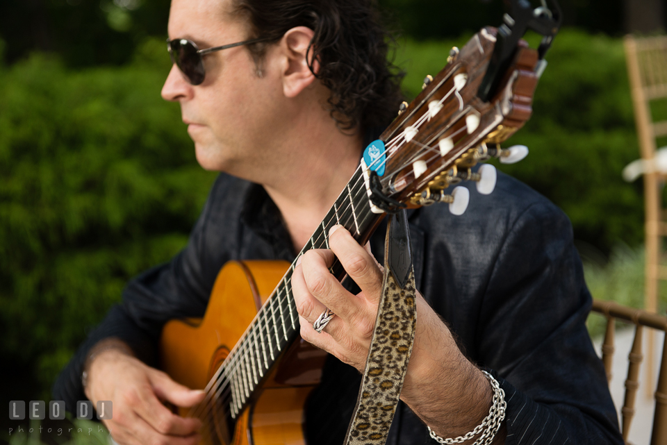 Guitarist from Duo Caliente via Bialek's Music playing during ceremony. Falls Church Virginia 2941 Restaurant wedding ceremony and reception photo, by wedding photographers of Leo Dj Photography. http://leodjphoto.com