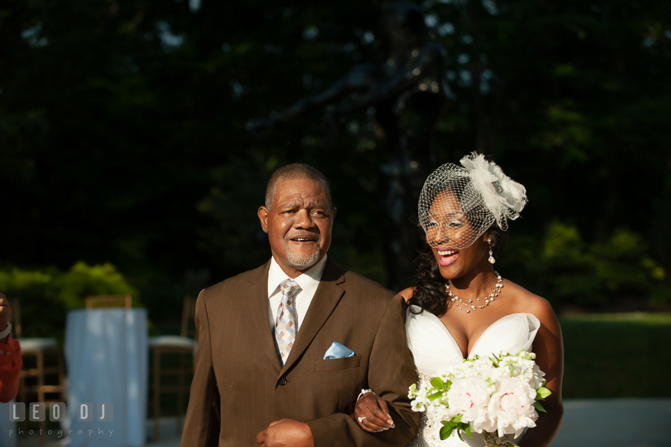 Uncle of the Bride escorted the Bride down the aisle for the wedding ceremony processional. Falls Church Virginia 2941 Restaurant wedding ceremony and reception photo, by wedding photographers of Leo Dj Photography. http://leodjphoto.com