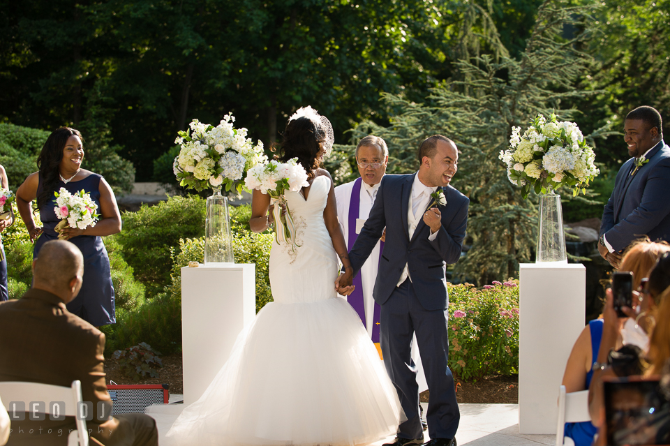 Bride and Groom excited after they are officially husband and wife. Falls Church Virginia 2941 Restaurant wedding ceremony and reception photo, by wedding photographers of Leo Dj Photography. http://leodjphoto.com