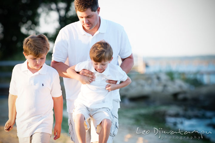 Father walking together on the beach with his children. Kent Island, Annapolis, MD Fun Candid Family Lifestyle Photographer, Leo Dj Photography