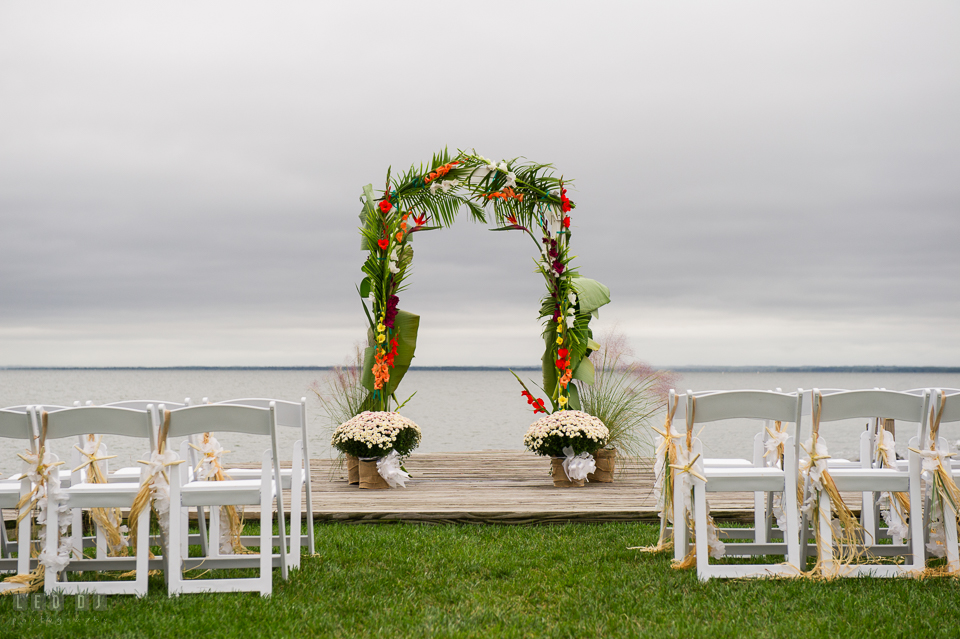 Silver Swan Bayside tropical themed plant wedding ceremony arch photo by Leo Dj Photography