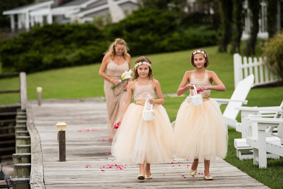 Silver Swan Bayside flower girls tossing rose flower petals photo by Leo Dj Photography