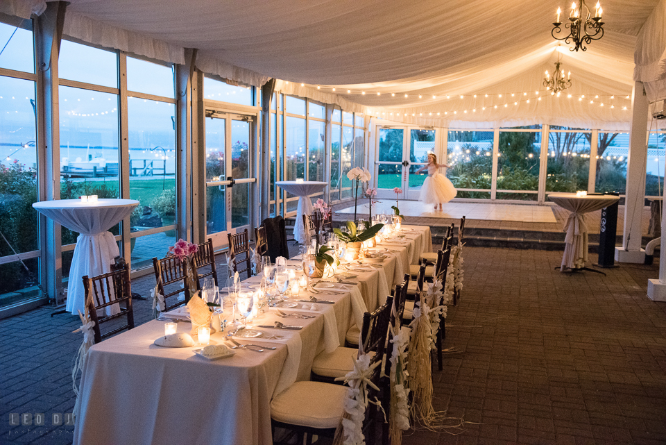 Silver Swan Bayside Bride wedding reception with tropical themed table setting decor with sea shells, starfish, and grass skirt tassels photo by Leo Dj Photography