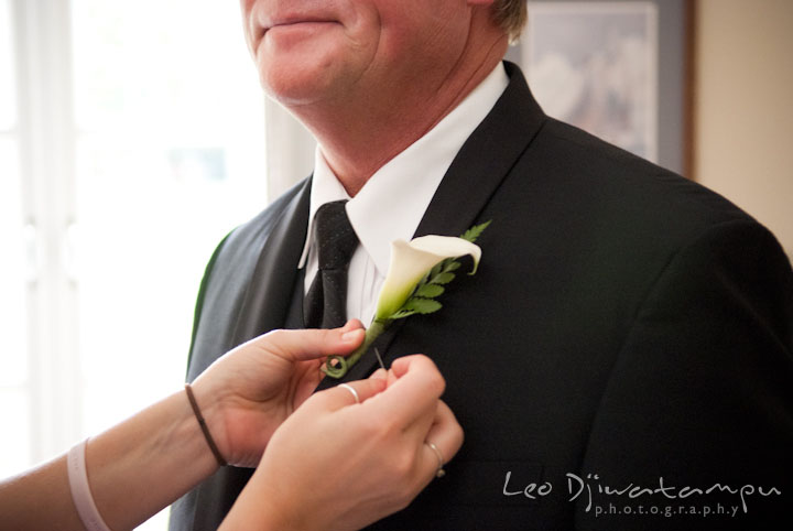 Daughter help groom put boutonniere. Mariott Aspen Wye River Conference Center Wedding photos at Queenstown Eastern Shore Maryland, by photographers of Leo Dj Photography.