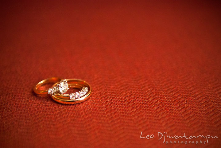 Bride's wedding ring and engagement ring and groom's wedding band. Mariott Aspen Wye River Conference Center Wedding photos at Queenstown Eastern Shore Maryland, by photographers of Leo Dj Photography.