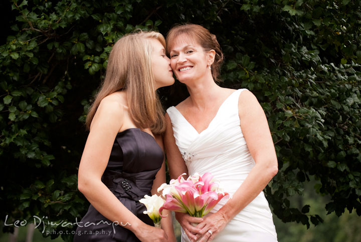Daughter kissing bride. Mariott Aspen Wye River Conference Center Wedding photos at Queenstown Eastern Shore Maryland, by photographers of Leo Dj Photography.