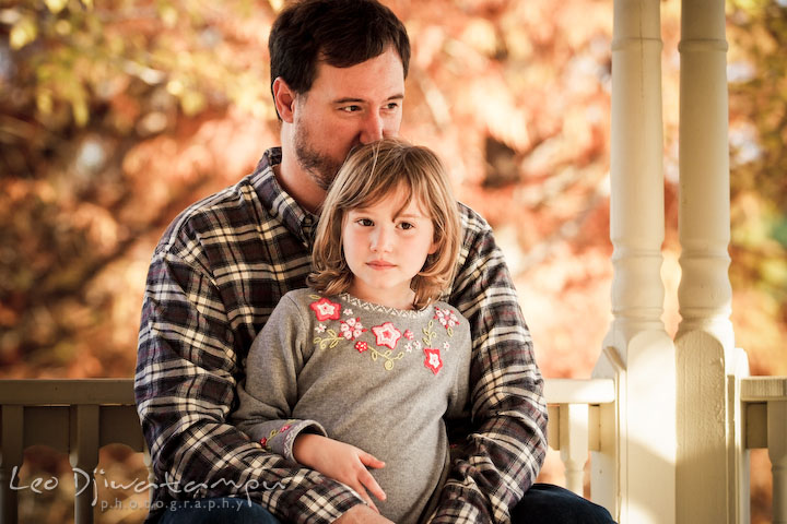father hugging daughter. Fun candid family children lifestyle photographer Annapolis Maryland