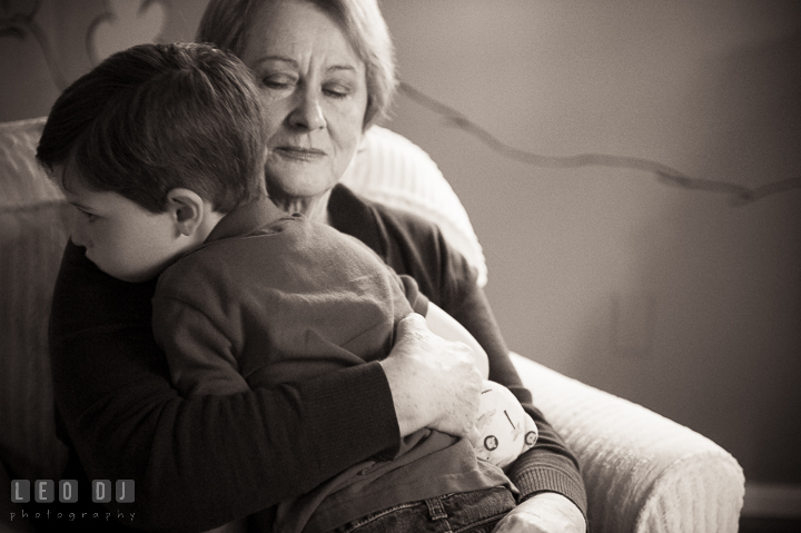 Grandmother hugging her grandson. Queenstown, Eastern Shore Maryland candid children and family lifestyle portrait photo session by photographers of Leo Dj Photography. http://leodjphoto.com