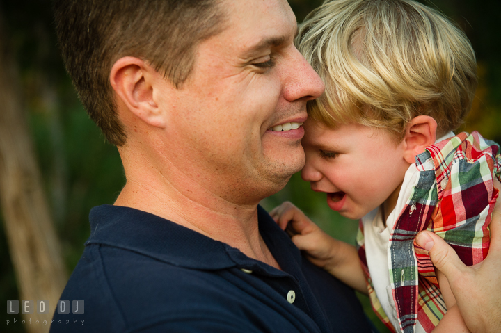 Dad playing and bonding with his youngest son. Queenstown, Eastern Shore Maryland candid children and family lifestyle portrait photo session by photographers of Leo Dj Photography. http://leodjphoto.com